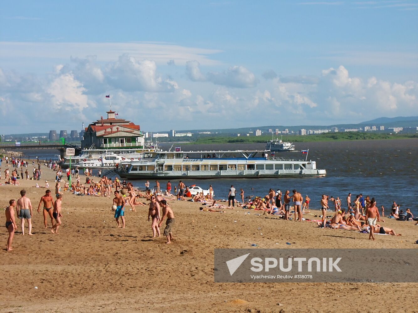 A beach and river-boat piers