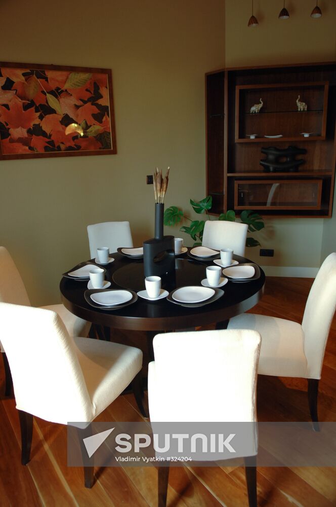 Dining-room interior, one of the Noviye Veshki cottages