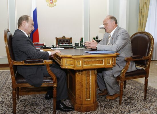 Vladimir Putin and Gennady Zyuganov
