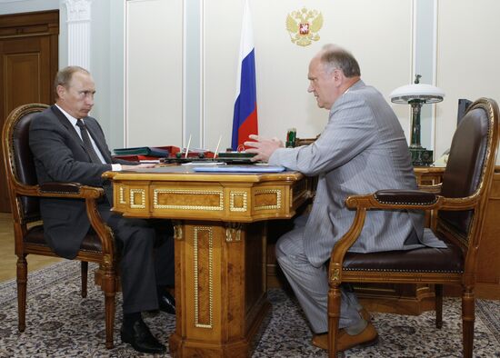 Vladimir Putin and Gennady Zyuganov