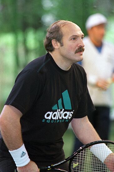 Belarusian President Alexander Lukashenko playing tennis