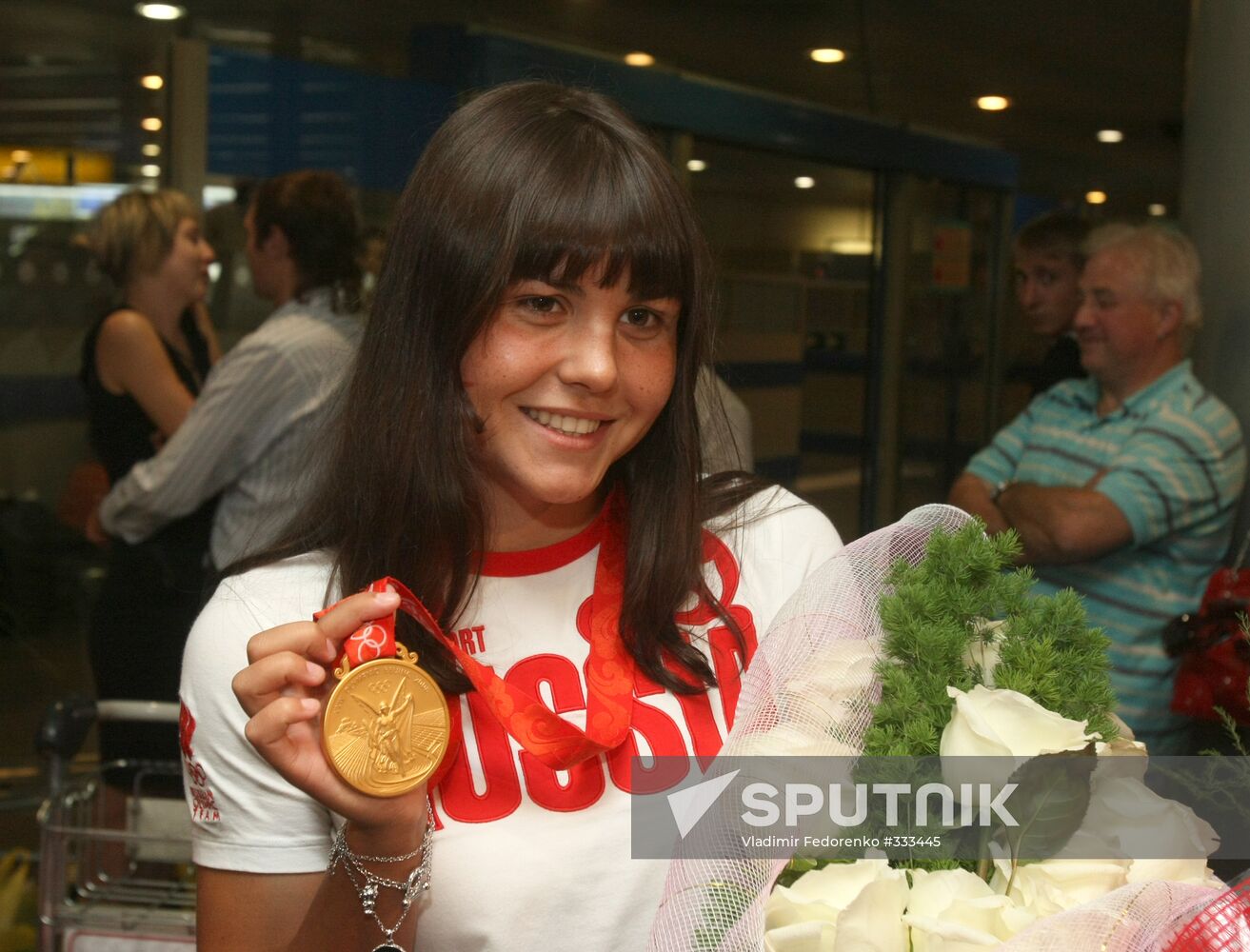 Russian sportsmen arriving back in Moscow
