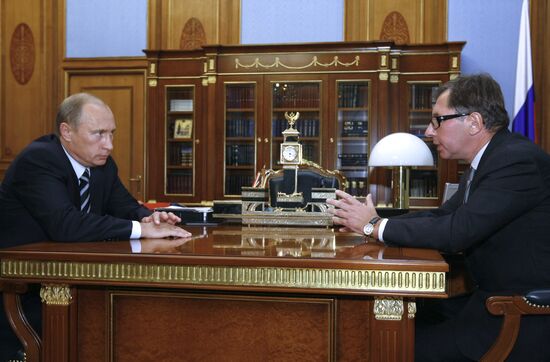 Vladimir Putin and Pyotr Aven