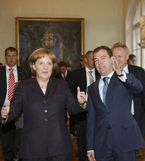 President Dmitry Medvedev and German Chancellor Angela Merkel