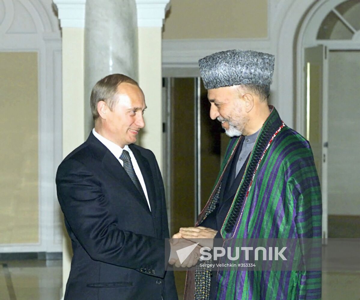 Vladimir Putin and Khamid Karzai