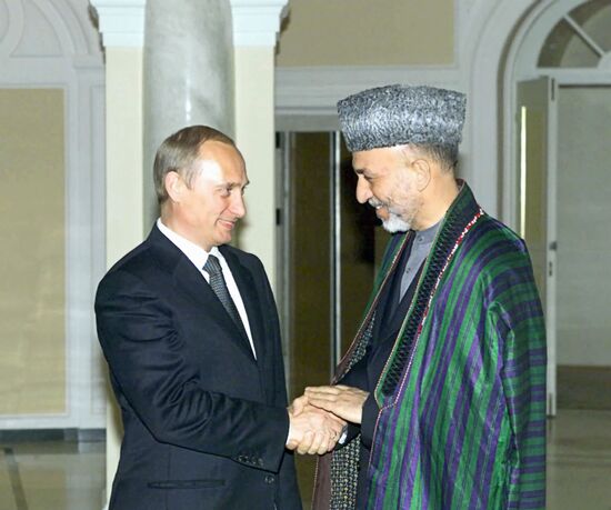 Vladimir Putin and Khamid Karzai