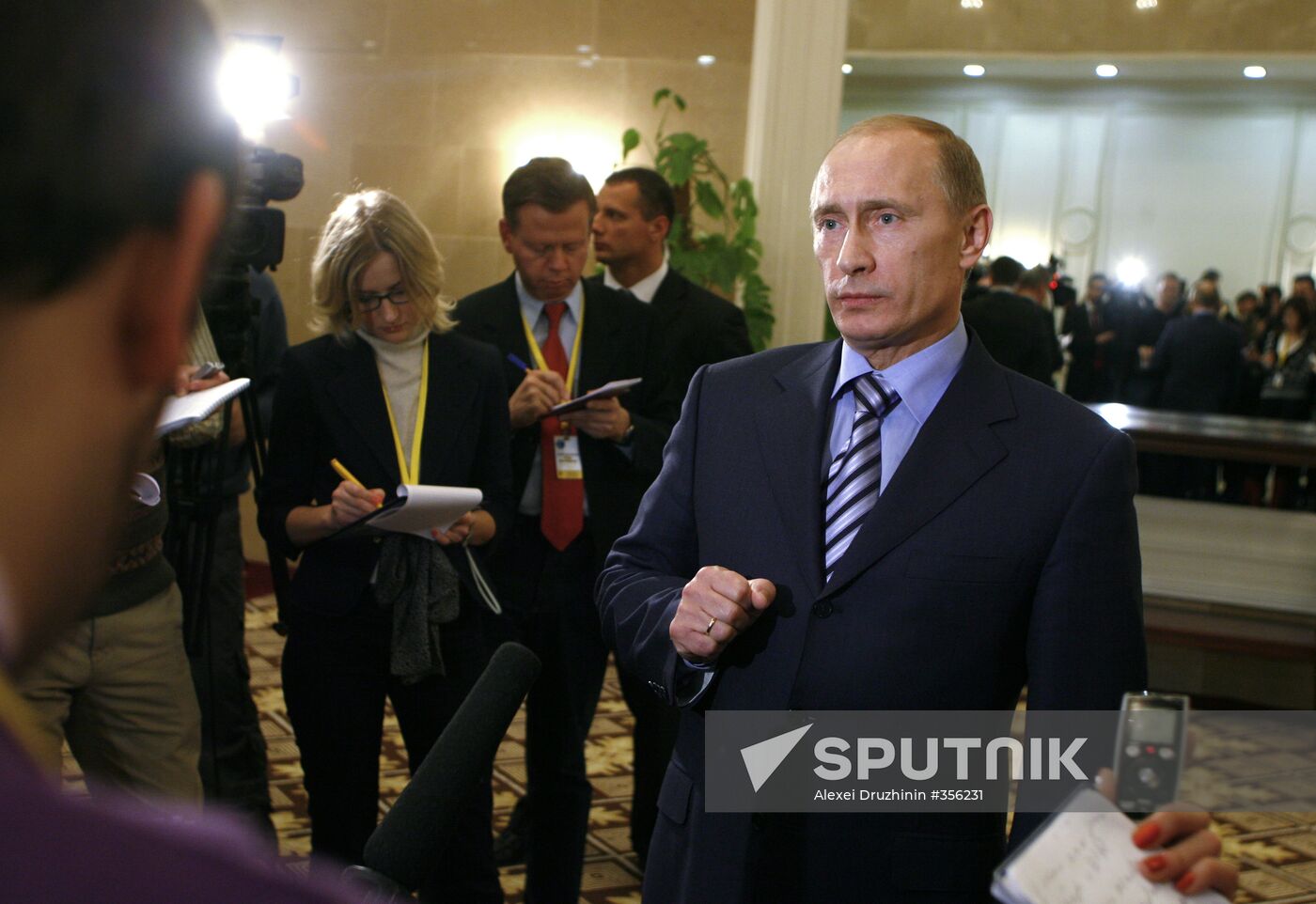 Prime Minister Vladimir Putin faces reporters