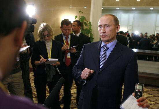 Prime Minister Vladimir Putin faces reporters