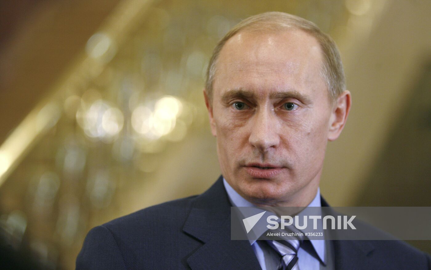 Prime Minister Vladimir Putin faces reporters