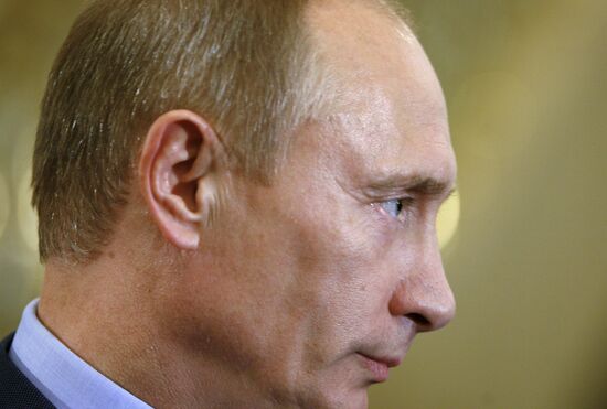 Prime Minister Vladimir Putin faces reporters