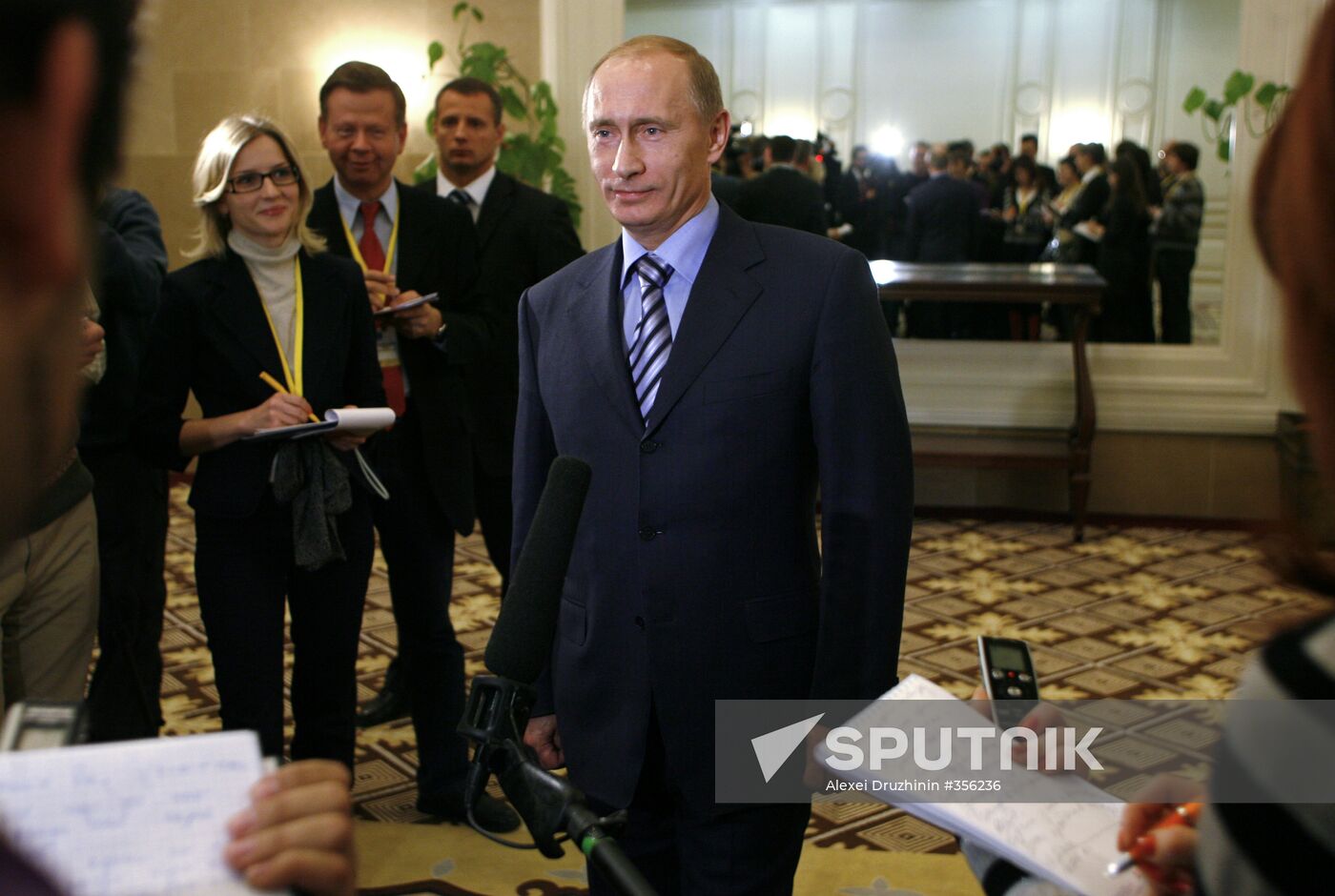 Prime Minister Vladimir Putin faces reporters