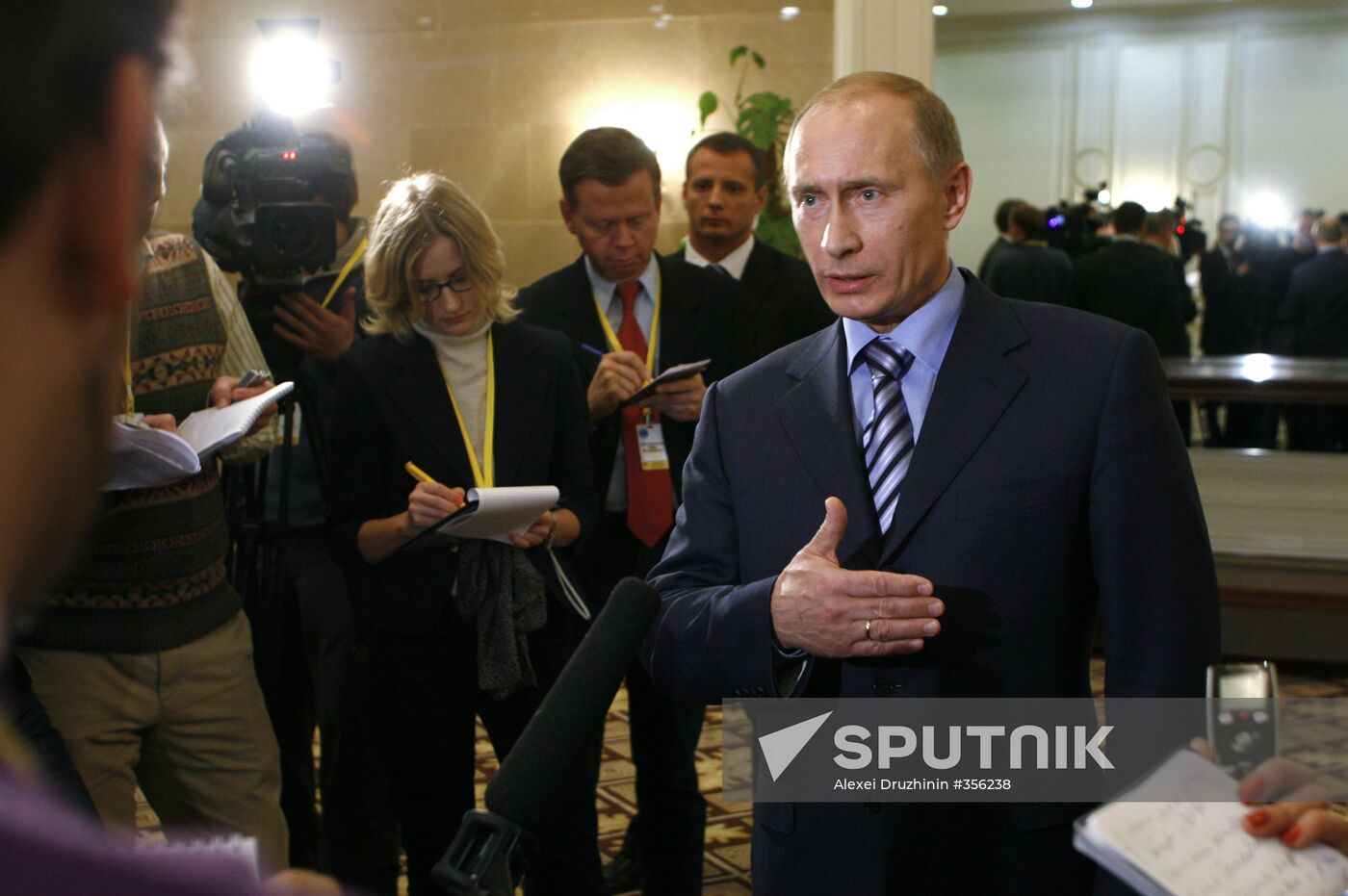 Prime Minister Vladimir Putin faces reporters