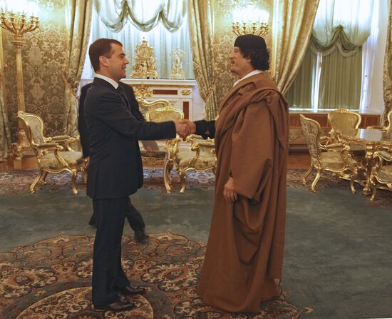 Dmitry Medvedev and Muammar Qaddafi