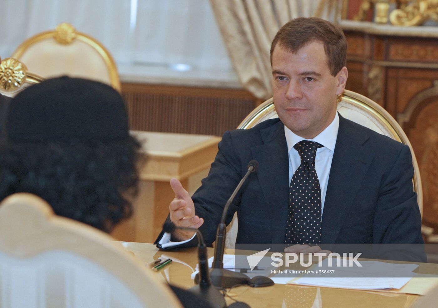 Dmitry Medvedev and Muammar Qaddafi