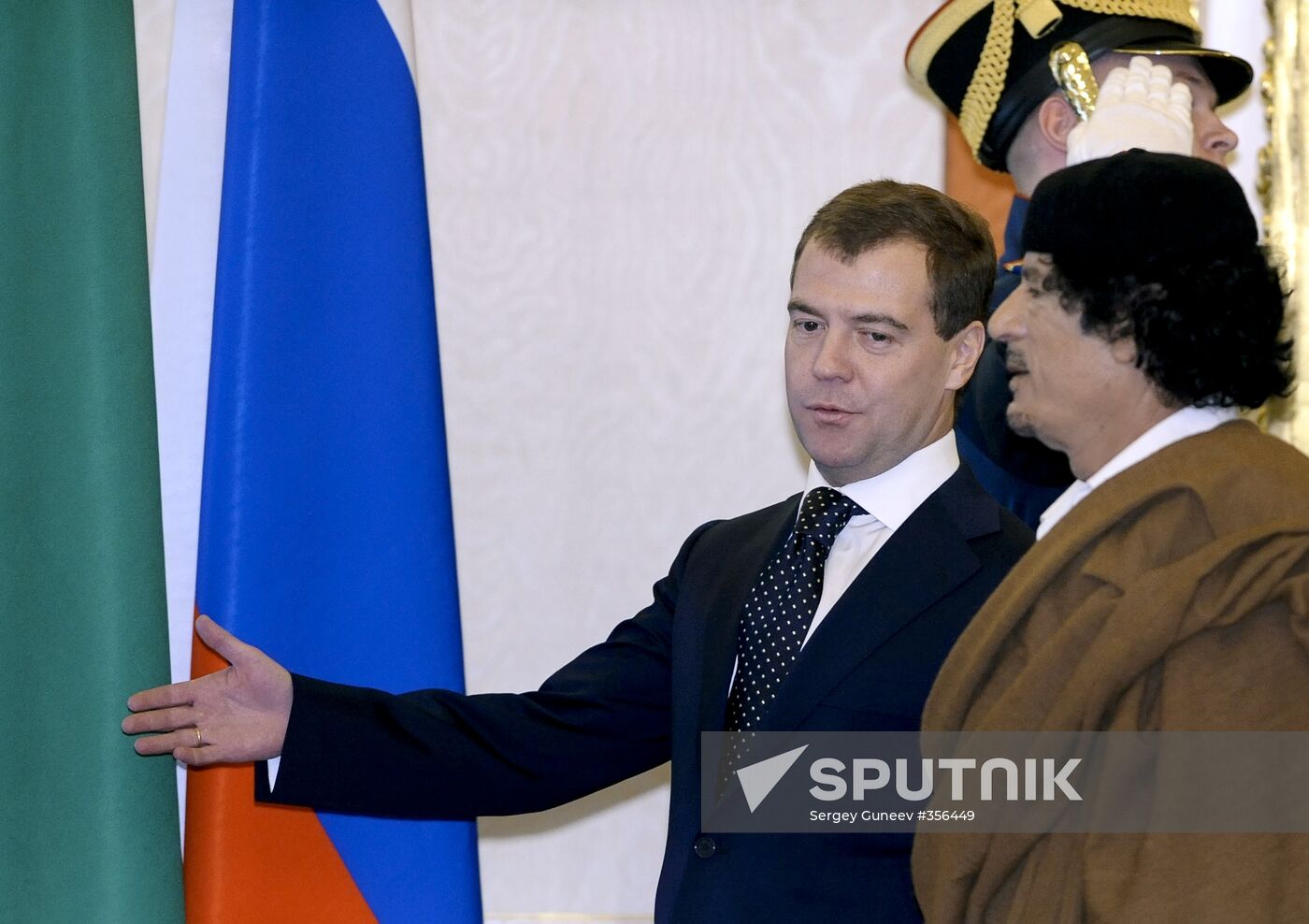 Dmitry Medvedev and Muammar Qaddafi