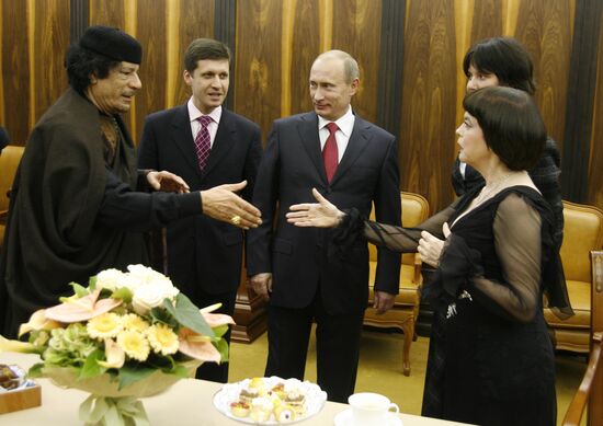 Vladimir Putin and Muammar Qaddafi at Mireille Mathieu's concert