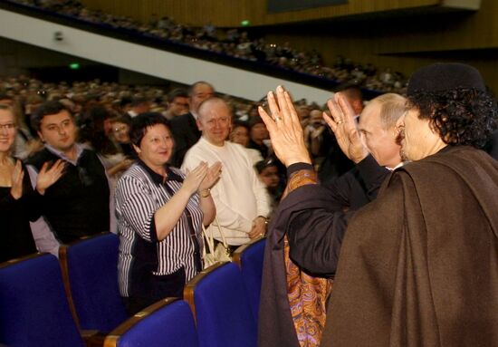 Vladimir Putin and Muammar Qaddafi at Mireille Mathieu's concert