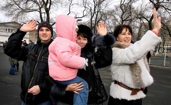 People see off Russia's Pacific Fleet ships