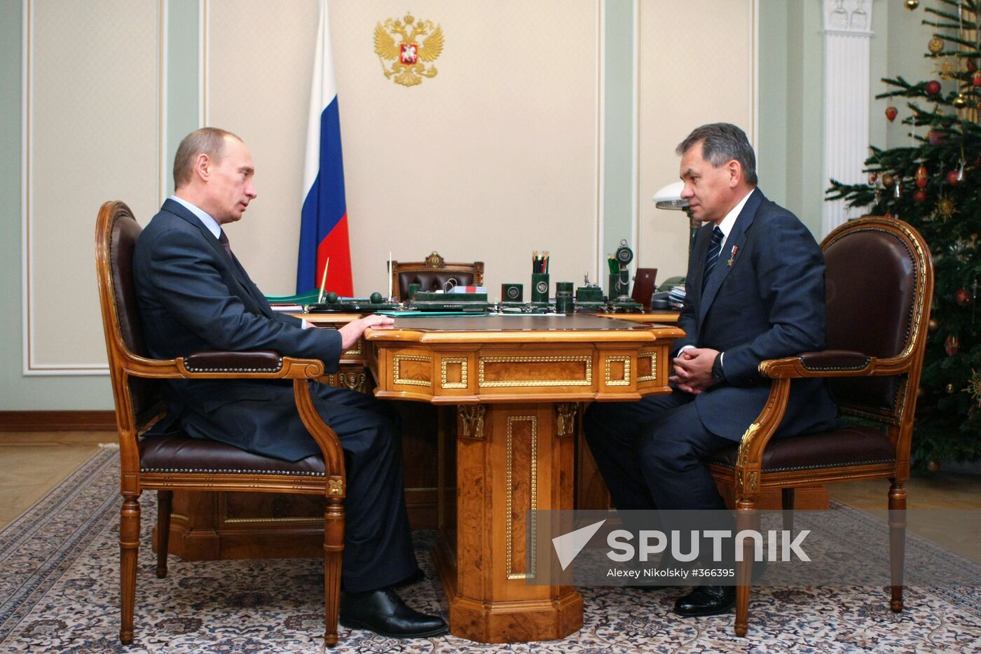 Vladimir Putin meets with Sergei Shoigu