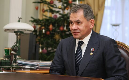 Vladimir Putin meets with Sergei Shoigu