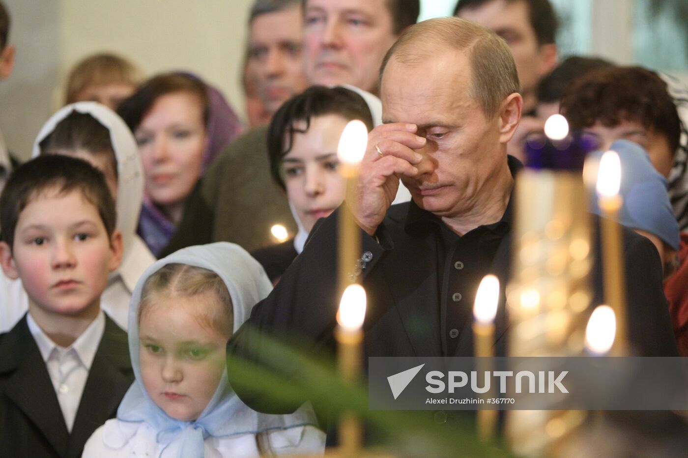 Vladimir Putin attends Christmas Mass in Petrozavodsk