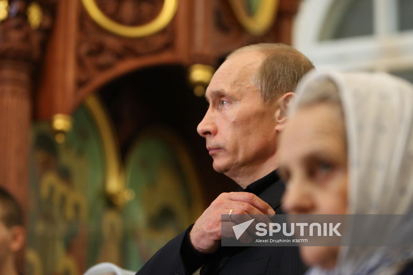 Vladimir Putin attends Christmas Mass in Petrozavodsk