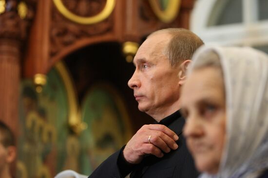 Vladimir Putin attends Christmas Mass in Petrozavodsk