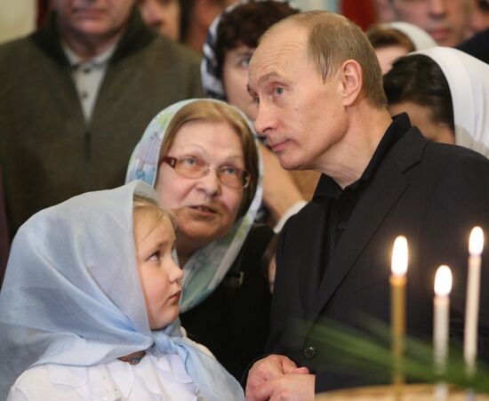 Vladimir Putin attends Christmas Mass in Petrozavodsk