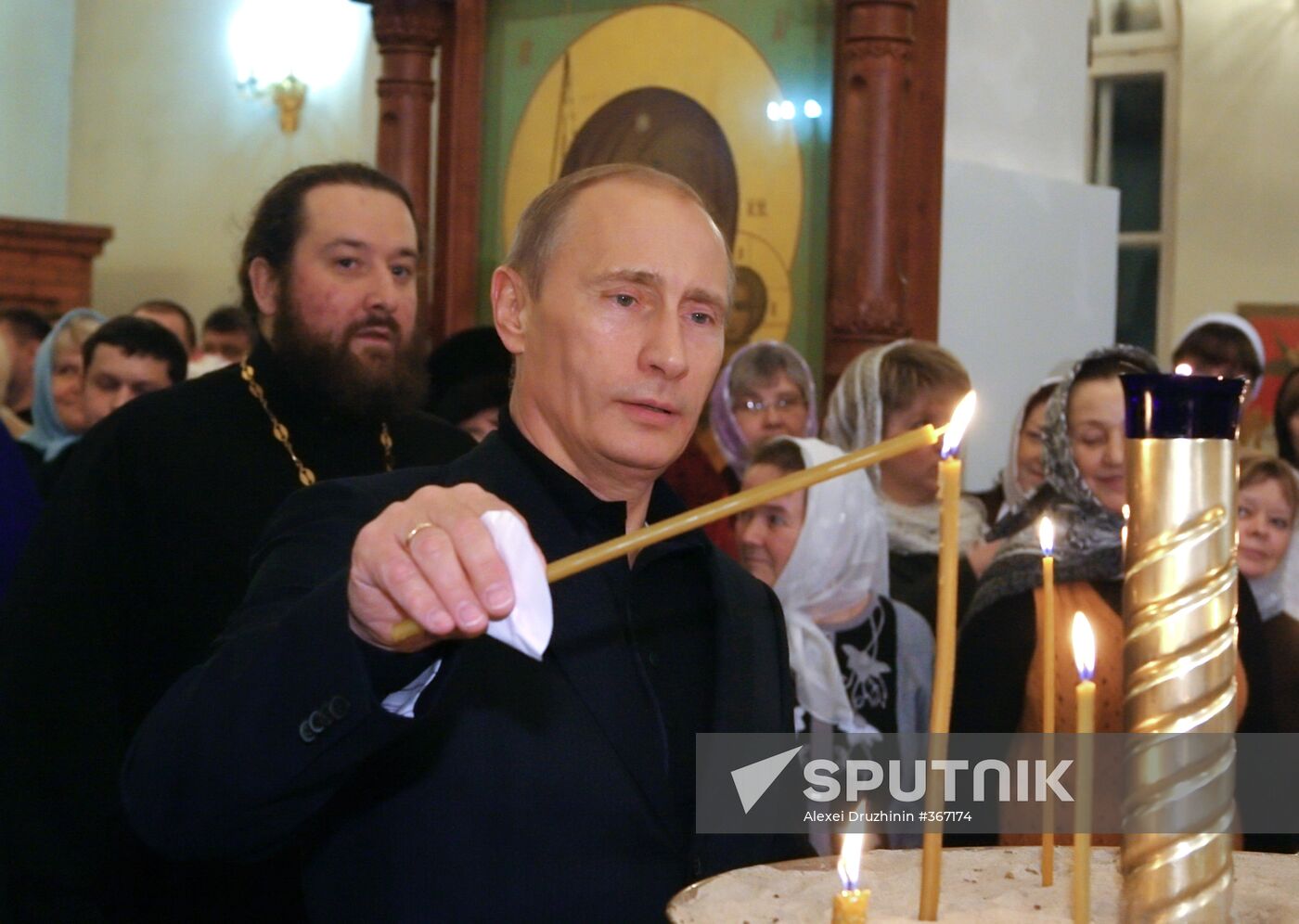 Vladimir Putin attends Christmas Mass in Petrozavodsk