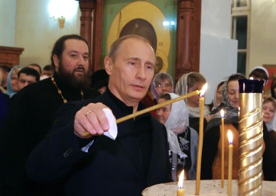 Vladimir Putin attends Christmas Mass in Petrozavodsk