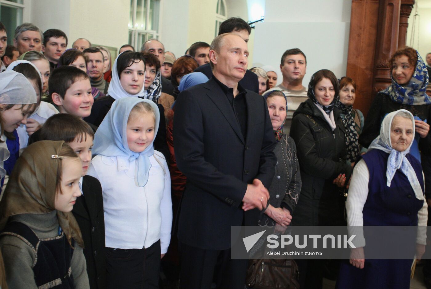 Vladimir Putin attends Christmas Mass in Petrozavodsk
