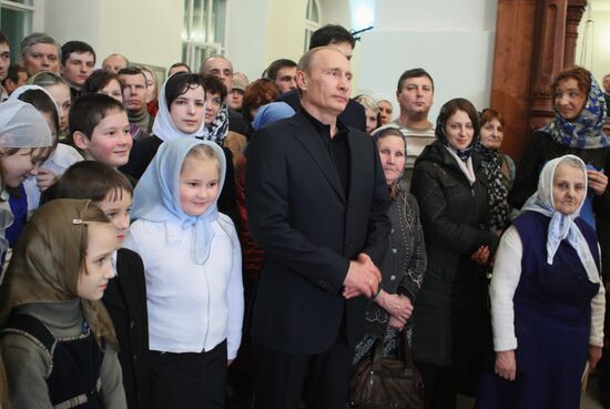 Vladimir Putin attends Christmas Mass in Petrozavodsk