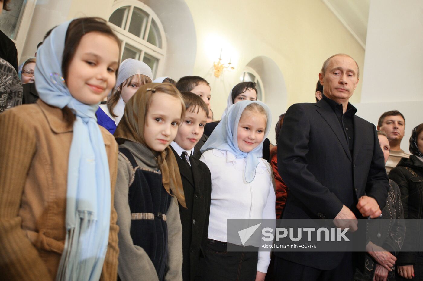 Vladimir Putin attends Christmas Mass in Petrozavodsk