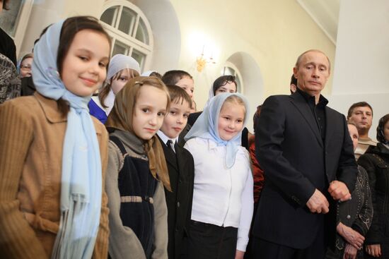 Vladimir Putin attends Christmas Mass in Petrozavodsk