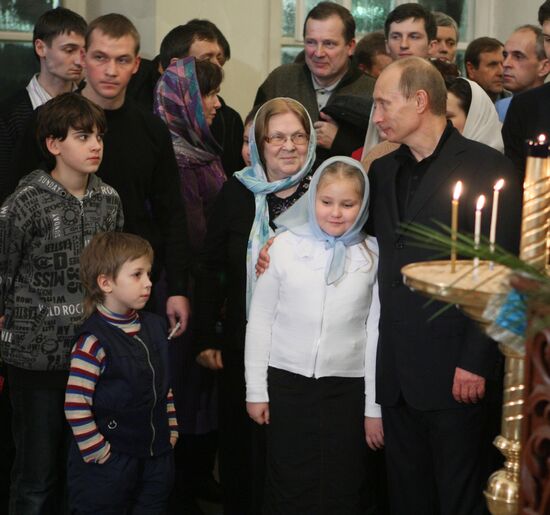Vladimir Putin attends Christmas Mass in Petrozavodsk