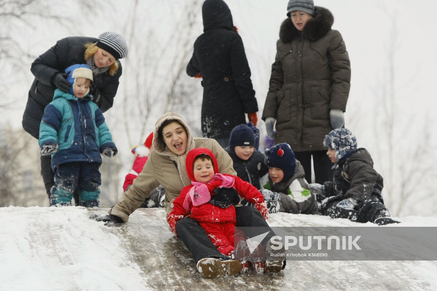 Children ice sliding in Moscow