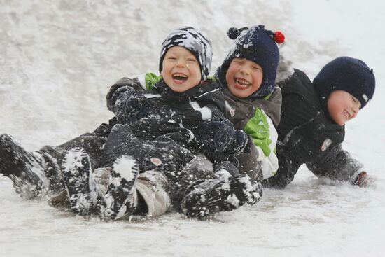 Children ice sliding in Moscow