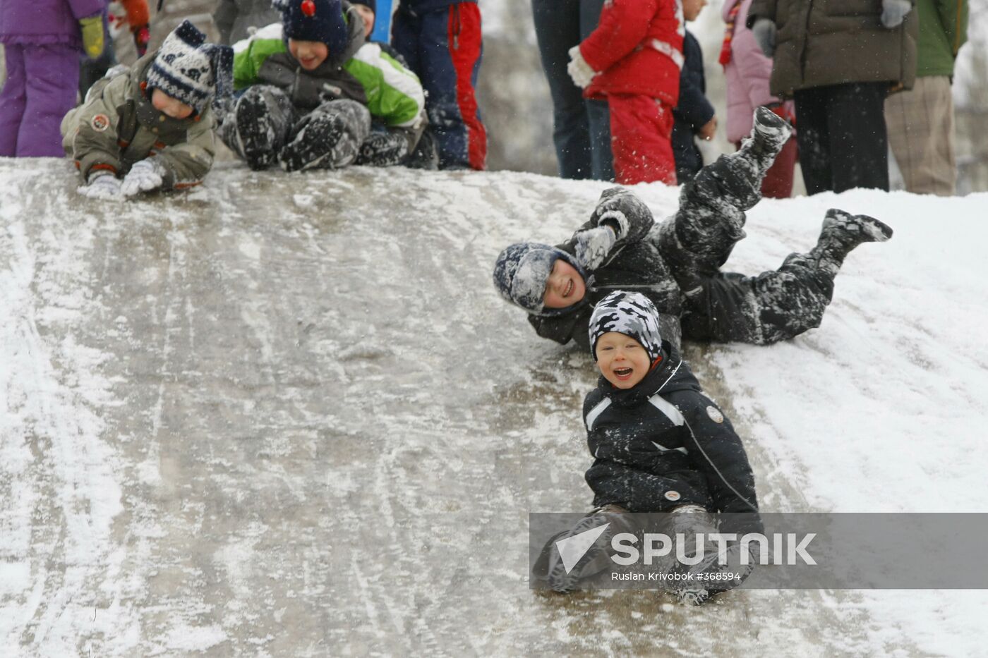 Children ice sliding in Moscow