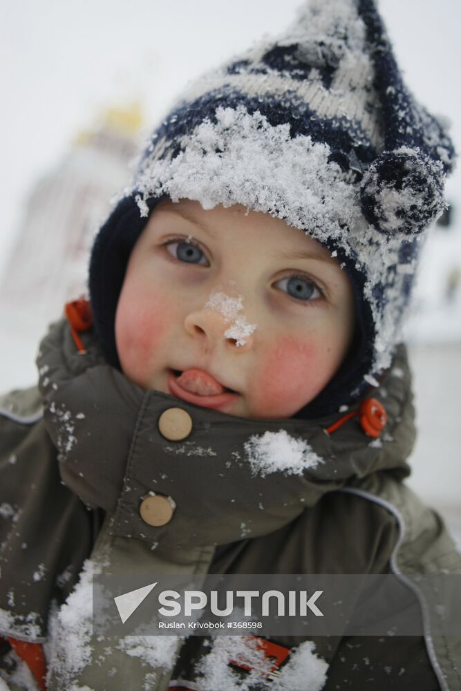 Children ice sliding in Moscow