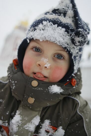 Children ice sliding in Moscow