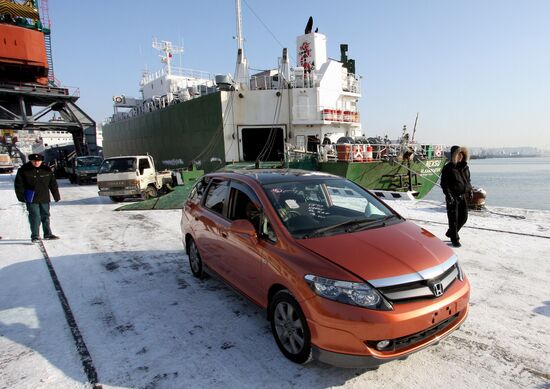 Unloading Japanese cars in Vladivostok port