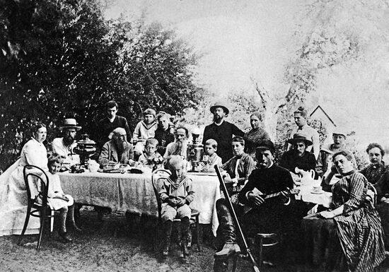 Leo Tolstoy amid family members and friends