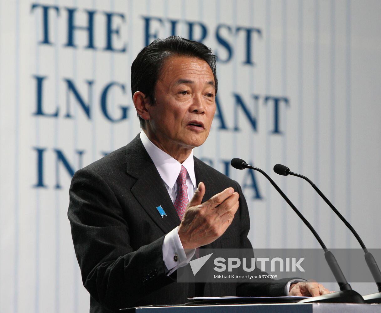 Taro Aso at a liquefied natural gas plant