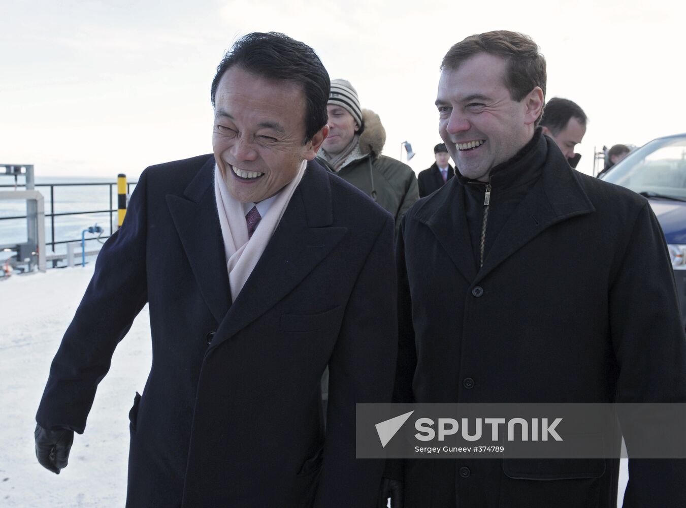 Dmitry Medvedev and Taro Aso examine Grand Aniva tanker