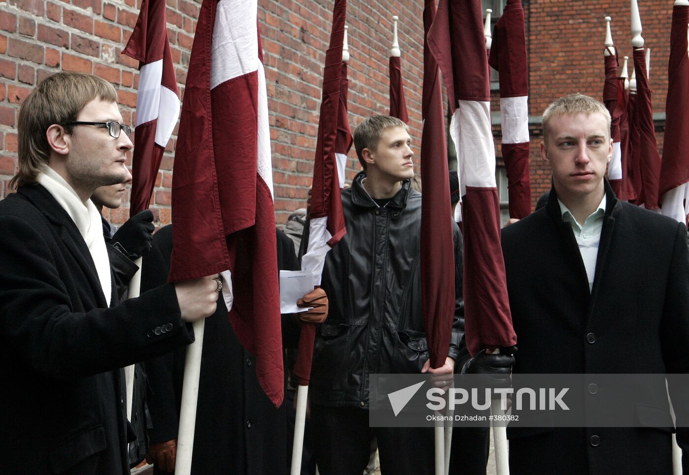 Waffen SS legionnaires and their supporters marching in Riga