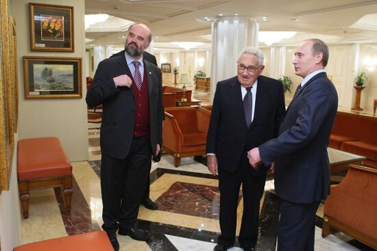 Russian PM meets with Henry Kissinger