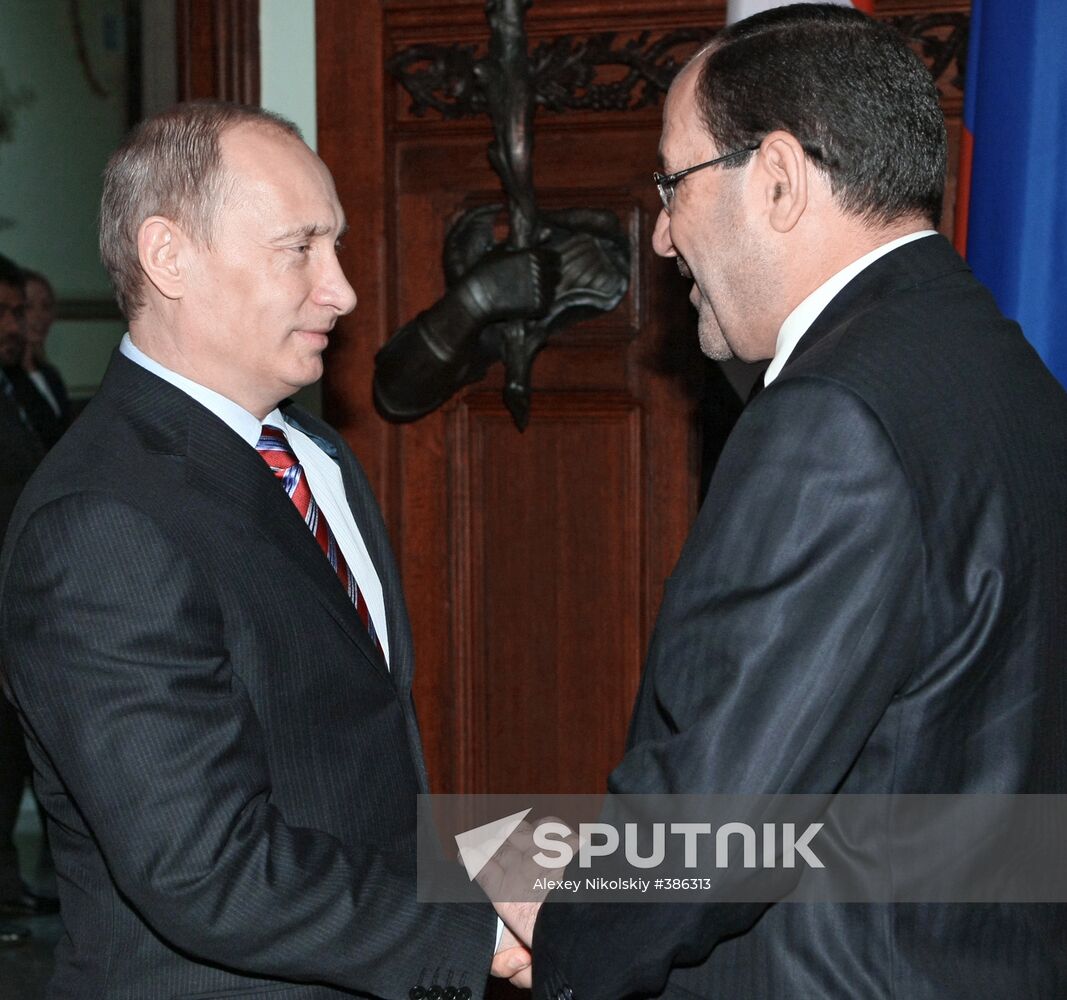 Vladimir Putin meets with Nouri al-Maliki