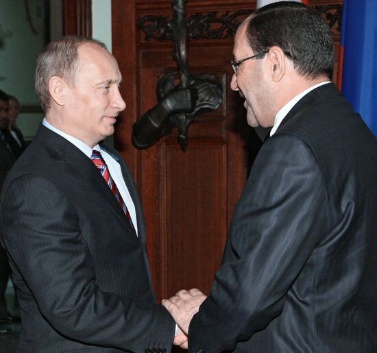 Vladimir Putin meets with Nouri al-Maliki