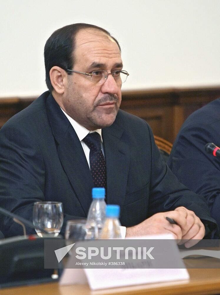 Vladimir Putin meets with Nouri al-Maliki