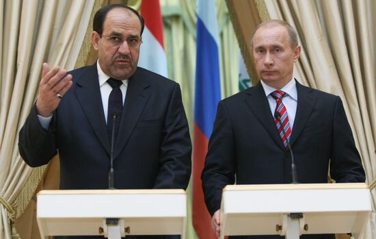 Prime Minister Vladimir Putin meets with Nouri al-Maliki